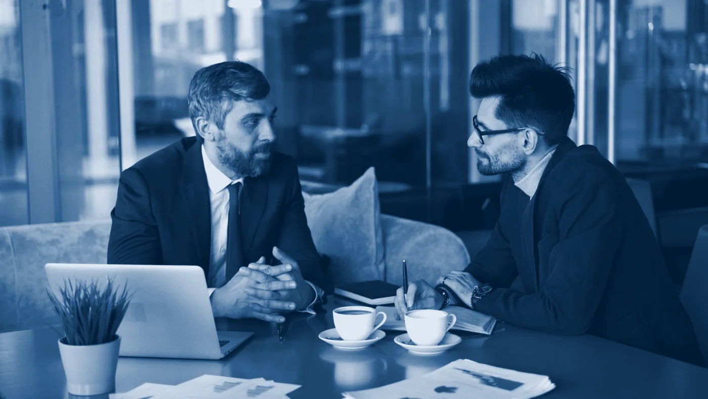 Two executives in discussion