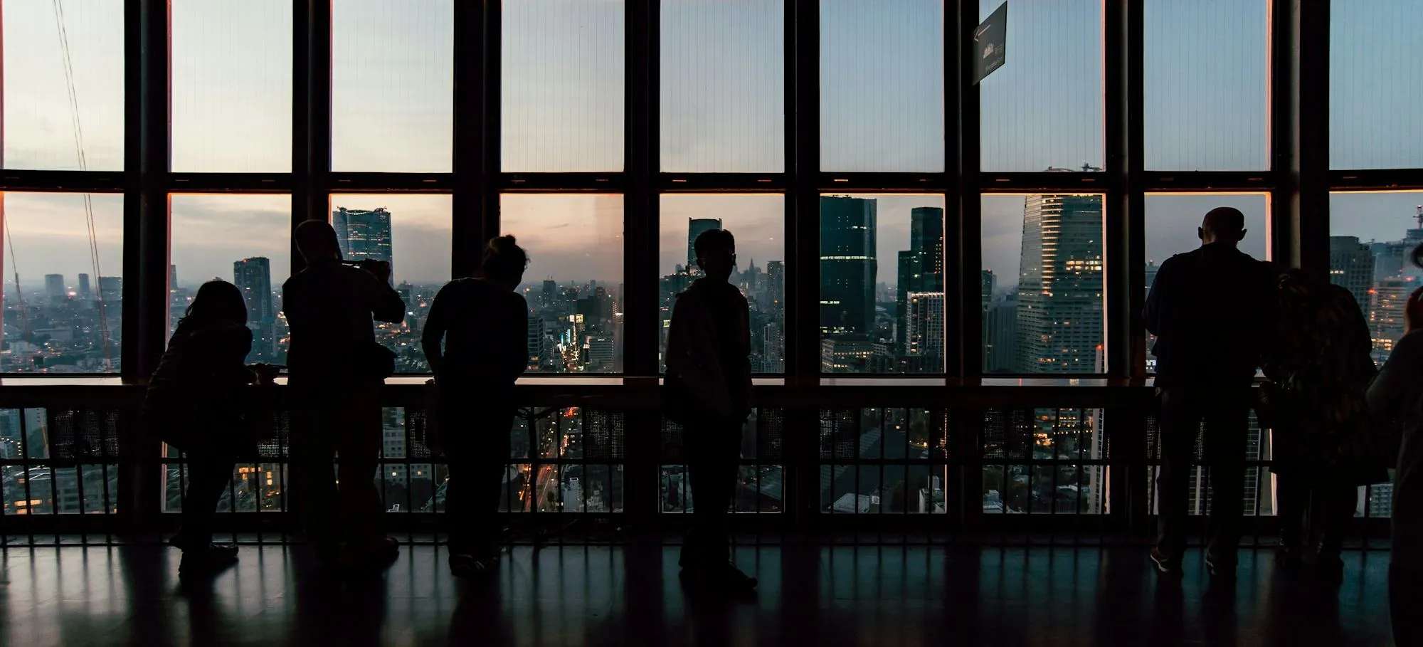 Advisers overlooking a financial district